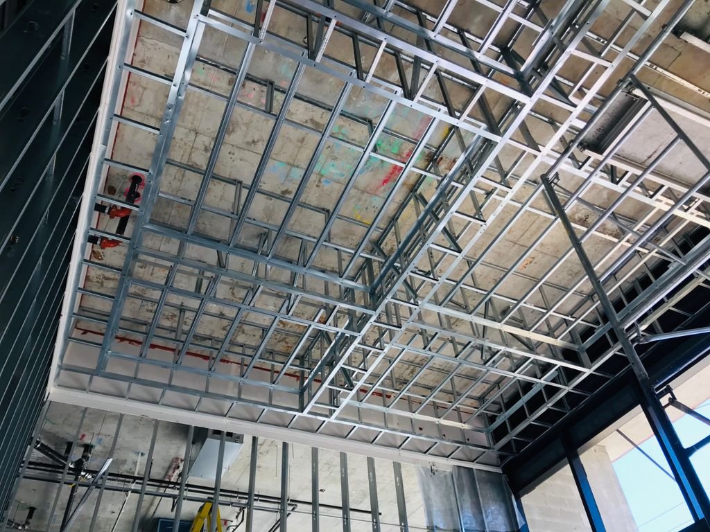 Arcadian Steel team working on commercial drywall and framing